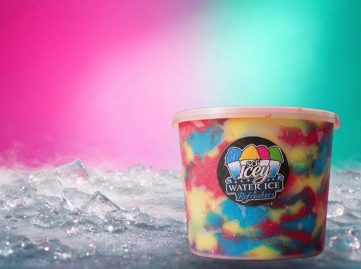 A rainbow swirl gallon on a hot pink icy ground with frost and sparkle